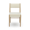 Minimalist beige boucle upholstered dining chair with light natural wood frame on white background