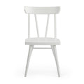 Minimalist white wooden dining chair with spindle back and contoured seat, modern Scandinavian-style kitchen chair on white background.