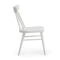 White painted wooden spindle-back dining chair with curved seat and tapered legs on white background