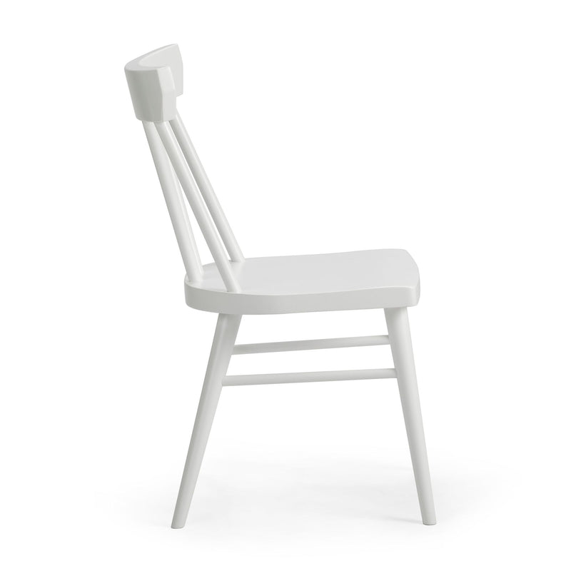 White painted wooden spindle-back dining chair with curved seat and tapered legs on white background