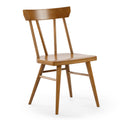 Mid-century modern wooden dining chair with spindle back and natural oak finish on white background