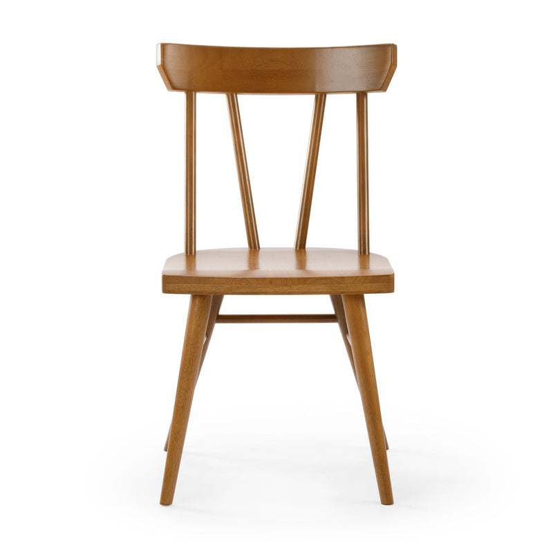 Mid-century modern oak wooden dining chair with spindle back and natural finish, isolated on white background