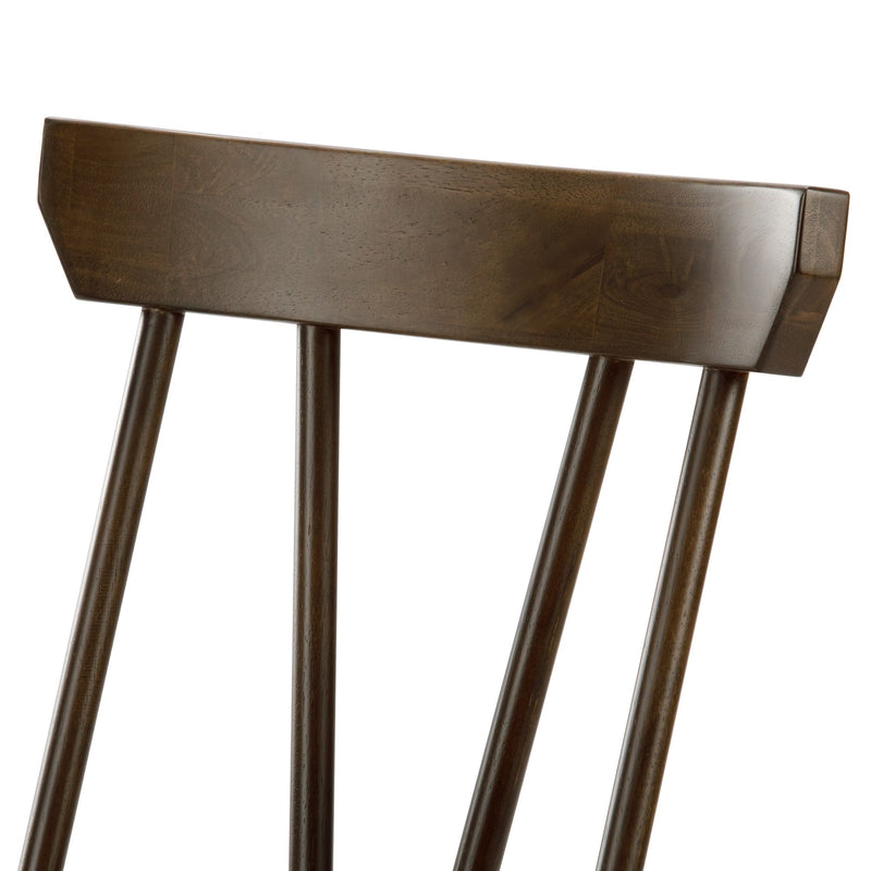 Close-up of dark walnut wooden dining chair back with rectangular top rail and three vertical spindle slats, smooth finish