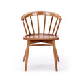 Front view of mid-century modern wooden spindle-back dining chair with rounded top rail and natural wood finish on white background