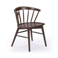 Mid-century modern walnut-finish wooden dining chair with curved spindle back, tapered legs and stretcher, isolated on white background