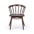 Brown wooden Windsor-style dining chair with curved spindle back and contoured seat, isolated on white background
