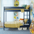 Navy kids bunk bed with yellow bedding, ladder, striped blue rug, storage baskets and colorful wall decals