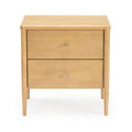 Light wood two-drawer bedside nightstand with tapered legs and round metal knobs, mid-century modern bedroom table