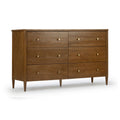 Mid-century modern six-drawer walnut dresser with brass knobs and tapered legs, solid wood bedroom storage chest