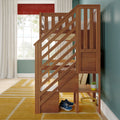Wooden loft bed with staircase and built-in storage in bright kids bedroom with teal wall, yellow rug, window and blue sneakers
