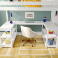 White loft bed with built-in desk study nook — modern kids workspace with laptop, blue lamp, markers, Rubik's cube and "Always Wonder" poster on teal wall