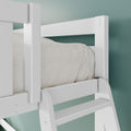Close-up of a white wooden bunk bed ladder and safety guardrail with beige bedding against a teal bedroom wall
