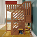 Wooden loft bunk bed with diagonal stairs and built-in cubbies in sunny kids' bedroom with teal wall and yellow rug